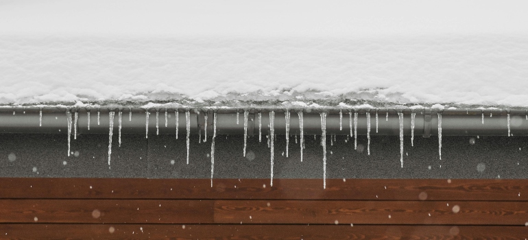 Ice and snow on the roof, hiding spring roof problems.